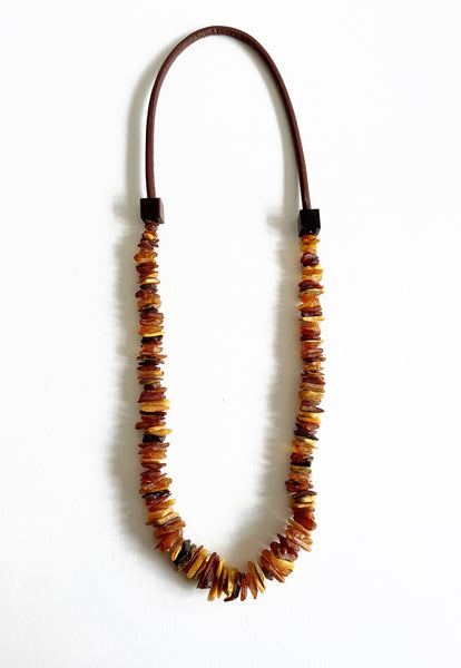 . NESHKA artwork 'AMBER & LEATHER NECKLACE' at Canada House Gallery