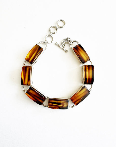 . NESHKA artwork 'AMBER & SILVER BRACELET' at Canada House Gallery