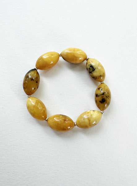 . NESHKA artwork 'OLIVE SHAPED BALTIC AMBER BRACELET' at Canada House Gallery