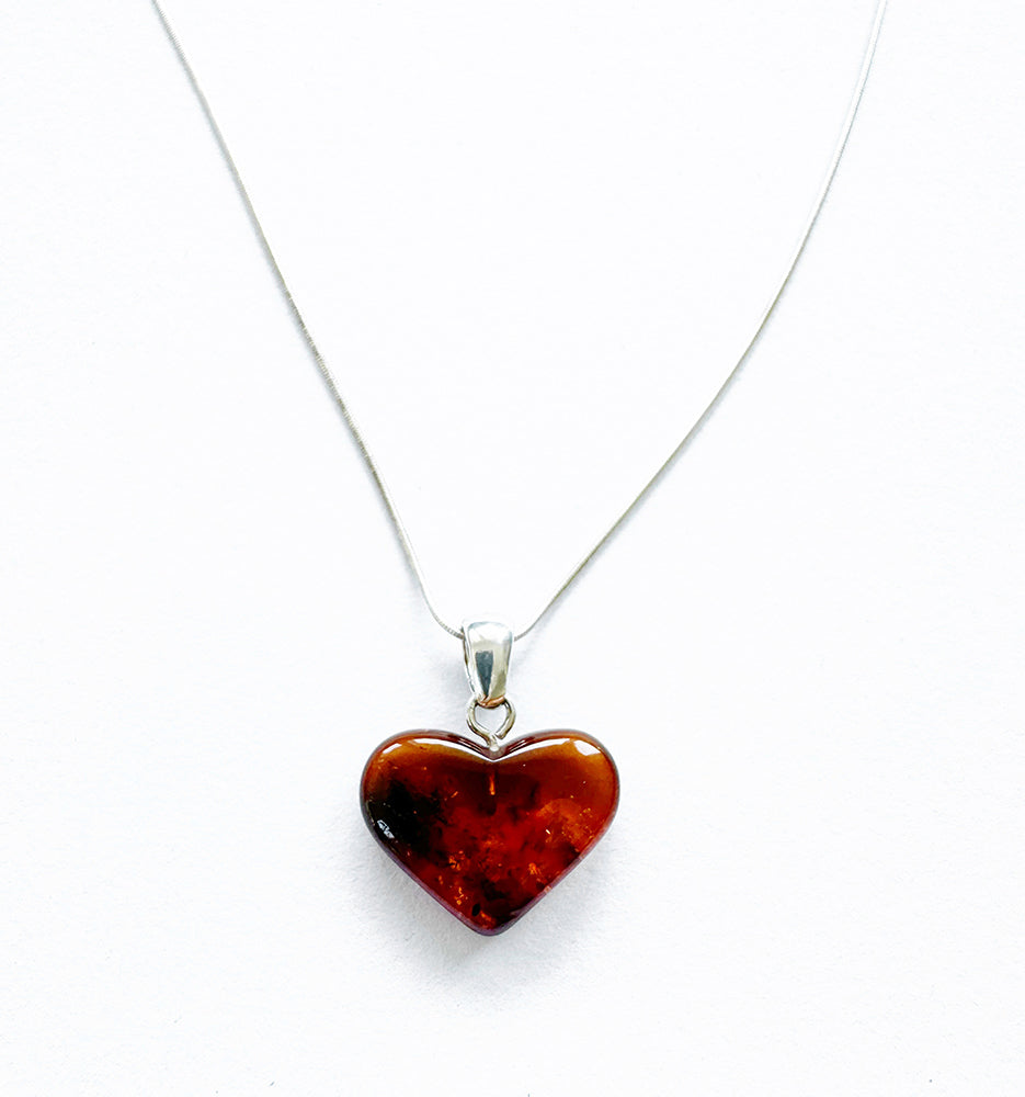 . NESHKA artwork 'AMBER HEART PENDANT' at Canada House Gallery