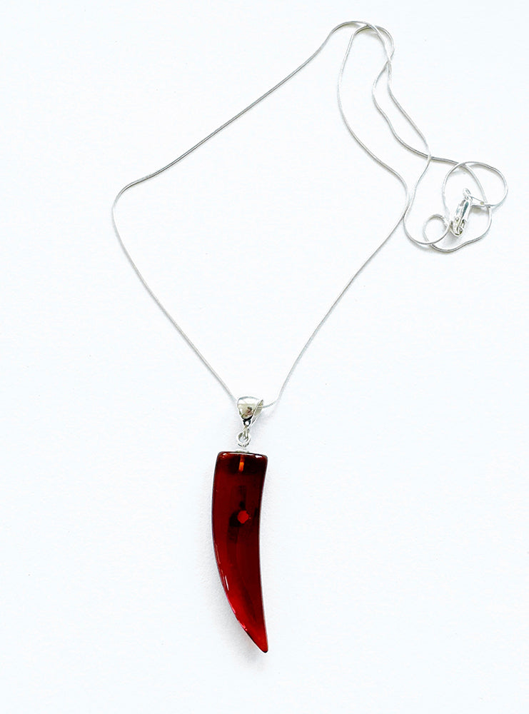 . NESHKA artwork 'LARGE AMBER SHARK TOOTH PENDANT' at Canada House Gallery