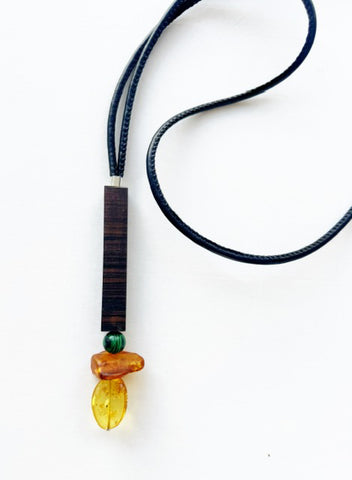 AMBER, TIGER EBONY AND MALACHITE