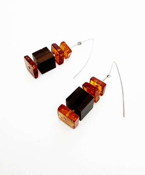 . NESHKA artwork 'AMBER AND EBONY WOOD EARRINGS' at Canada House Gallery