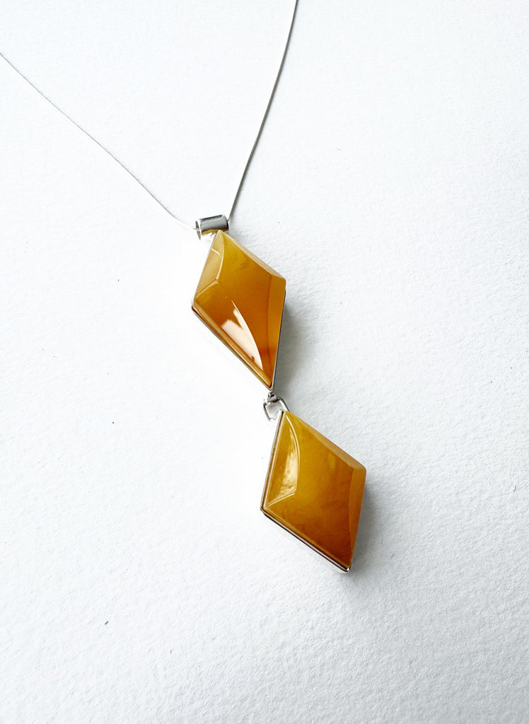 . NESHKA artwork 'FACETED AMBER PENDANT' at Canada House Gallery