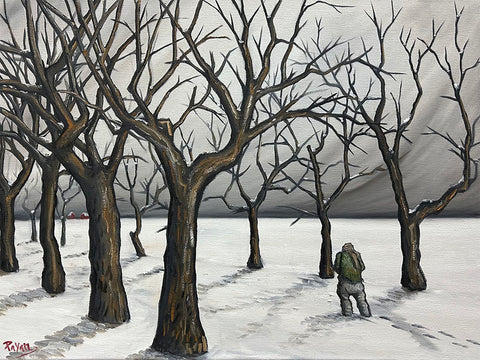 GUY WALKNG IN THE SNOW UP A TREE-LINED STREET