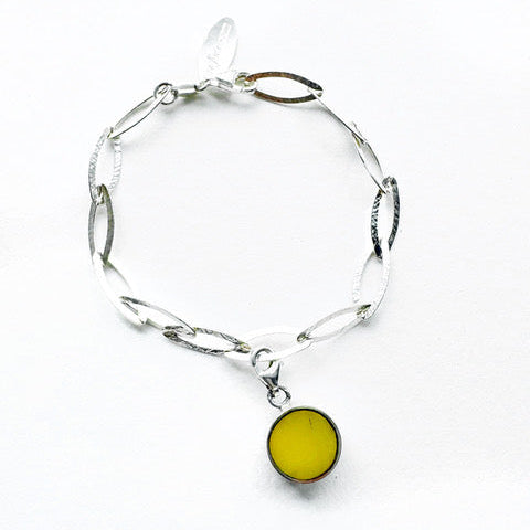 . NESHKA artwork 'SILVER AND AMBER CHARM BRACELET' at Canada House Gallery