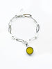 . NESHKA artwork 'SILVER AND AMBER CHARM BRACELET' at Canada House Gallery