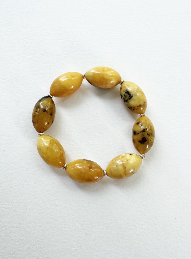 . NESHKA artwork 'OLIVE SHAPED BALTIC AMBER BRACELET' at Canada House Gallery