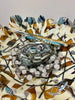 NEST ON METAL